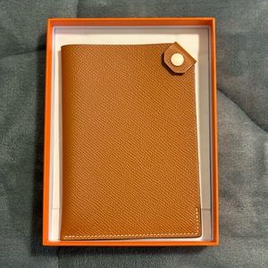Hermès Tarmac Passport Holder in Gold
